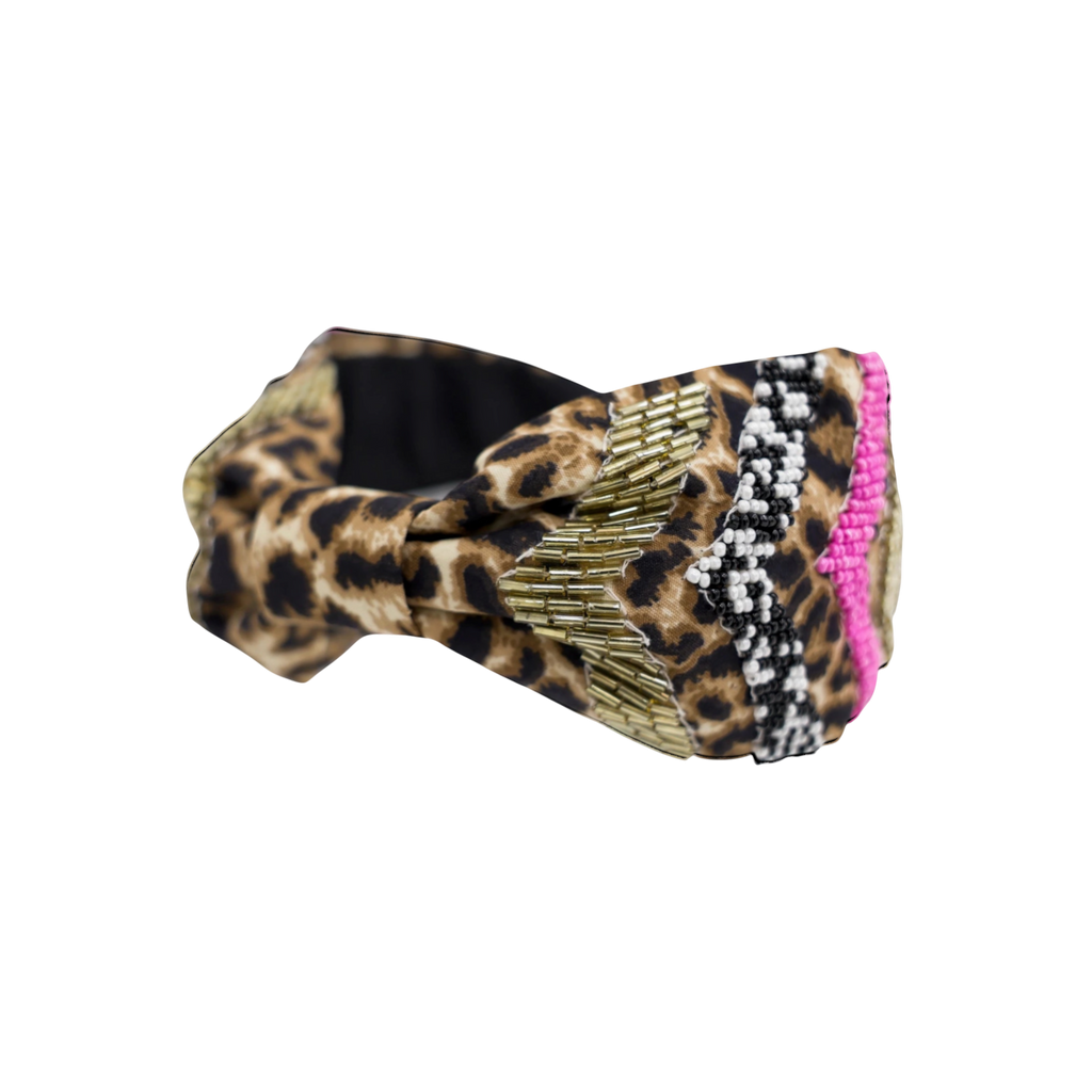 JOYCO Milena leopard print headband with beaded embroidery in gold, black, white, and pink.