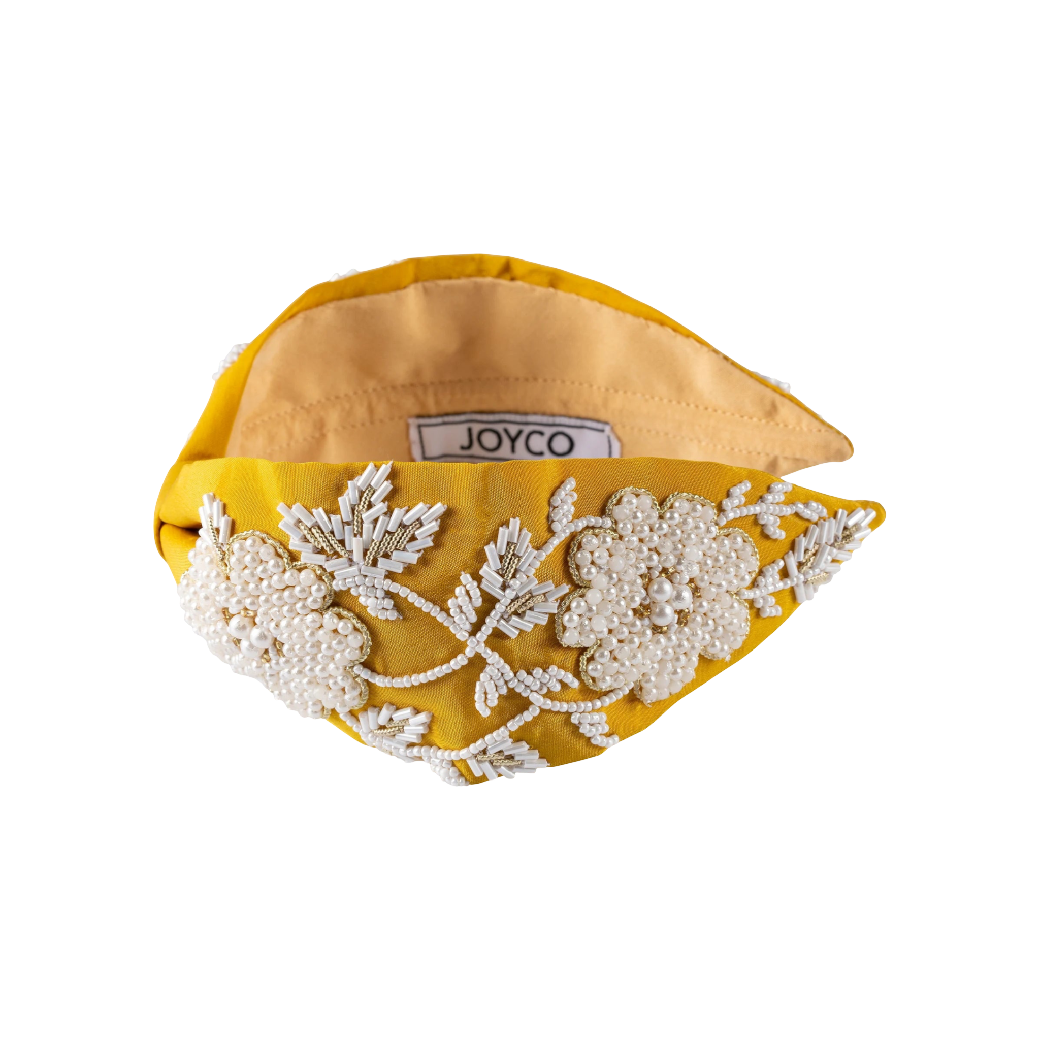 JOYCO mustard yellow headband with intricate white pearl and bead floral embroidery and gold accents.
